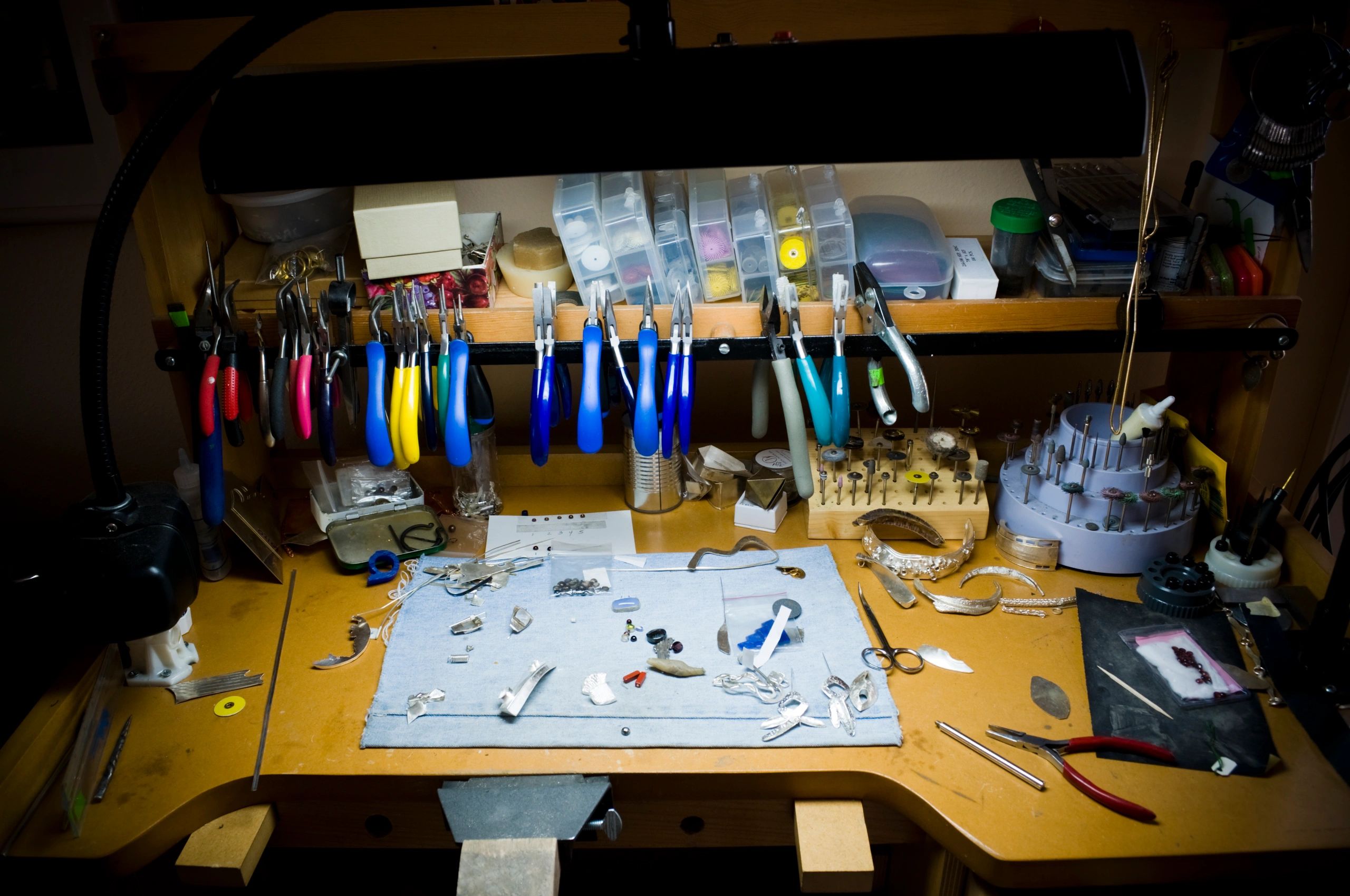 Workbench with hand tools used for detailed instrument repair