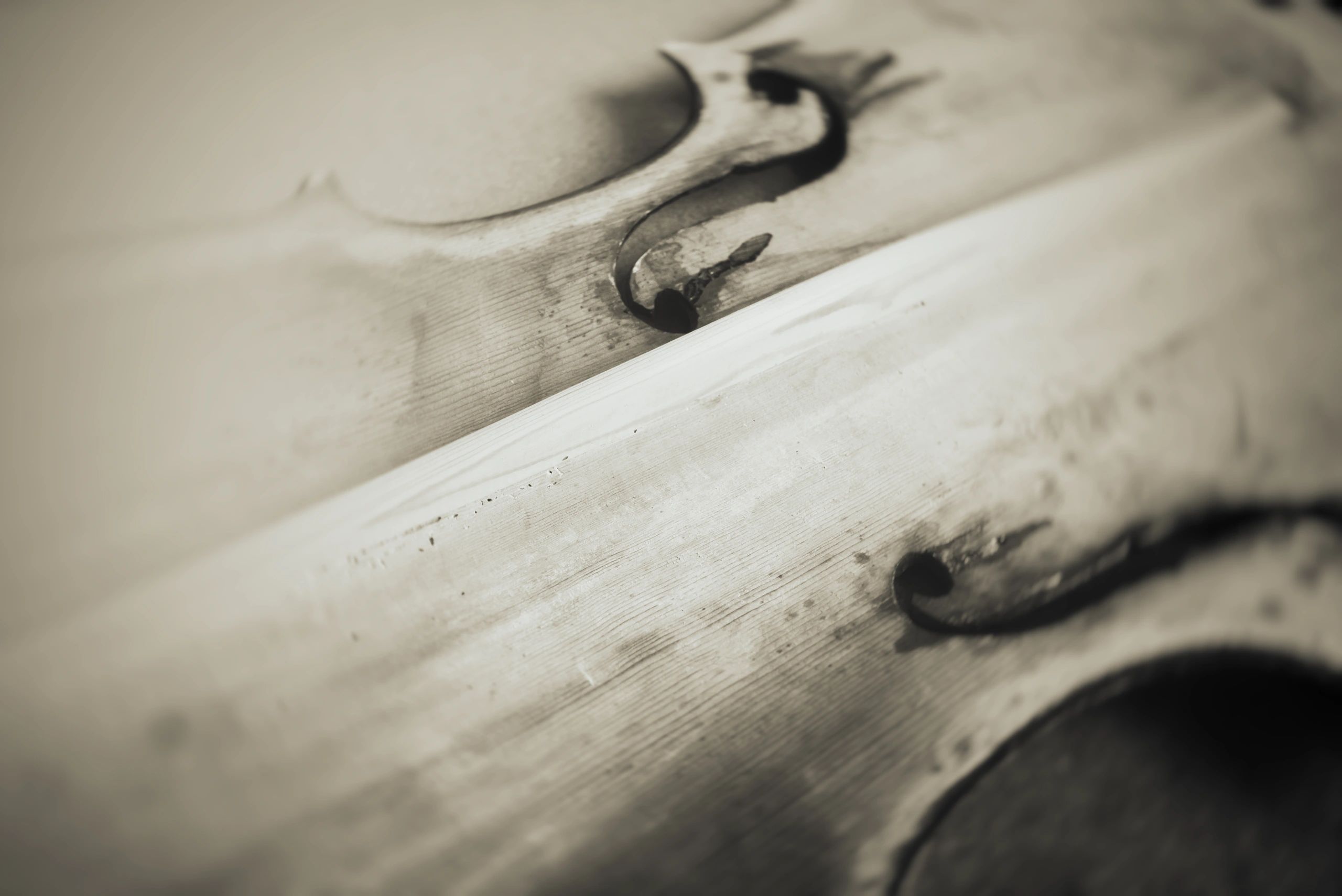 Broken violin being repaired